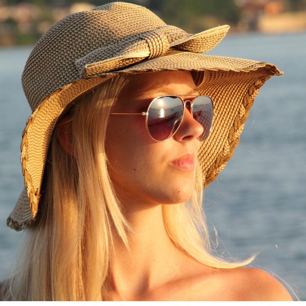 blonde hair under the sun hat