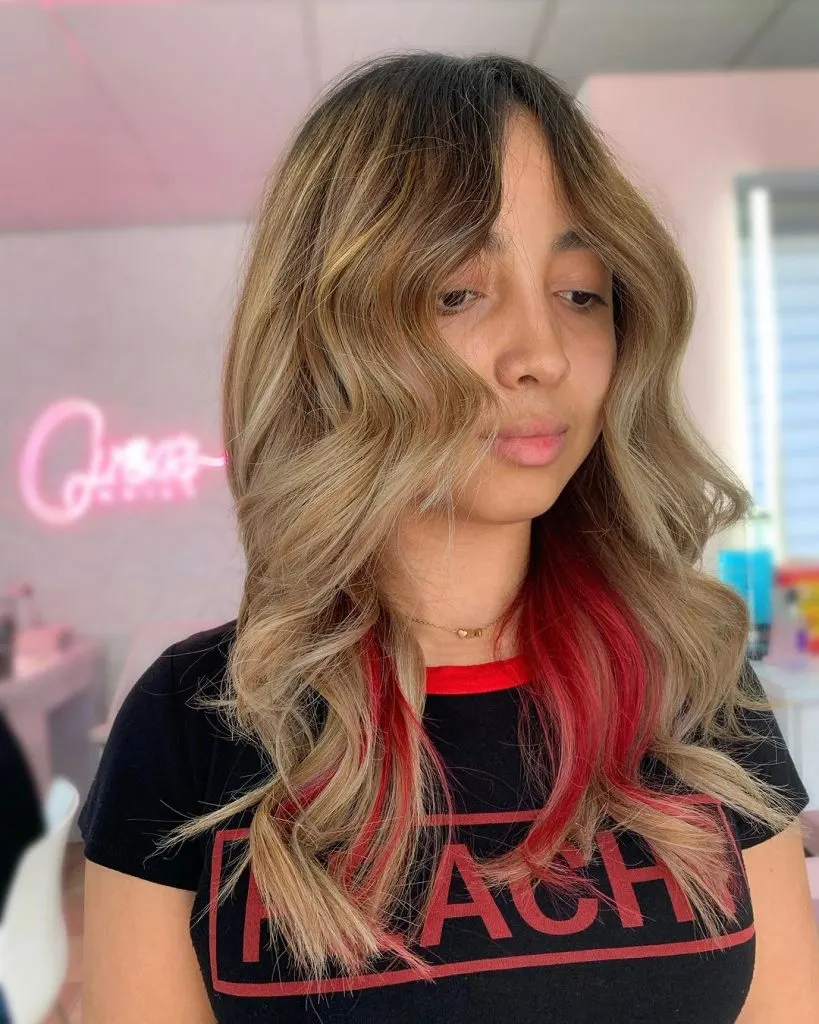 blonde hair with pop of red
