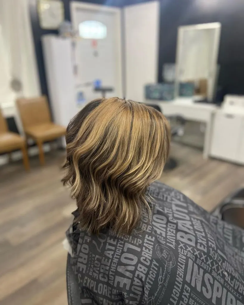 blonde highlights on dark hair for women over 50