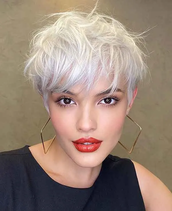 blonde pixie cut with bangs
