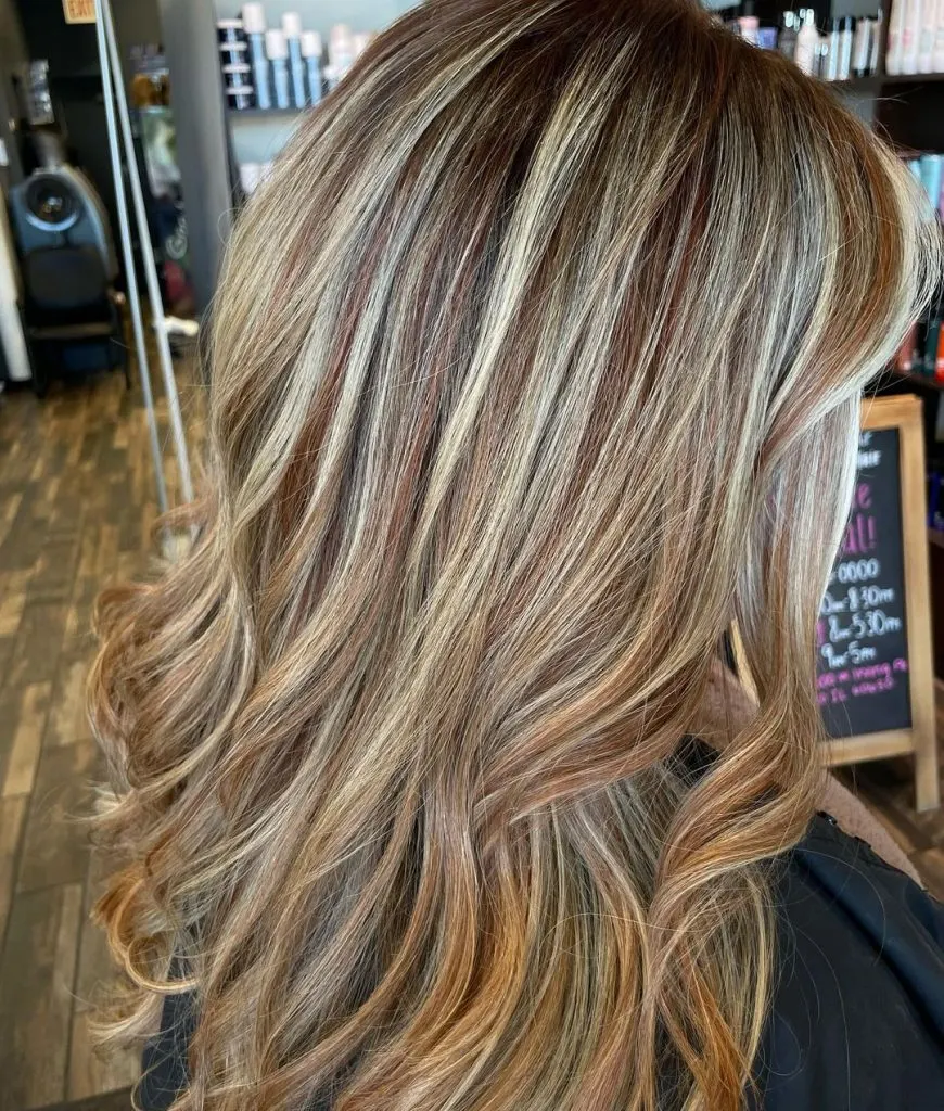 copper and blonde highlights on dark hair