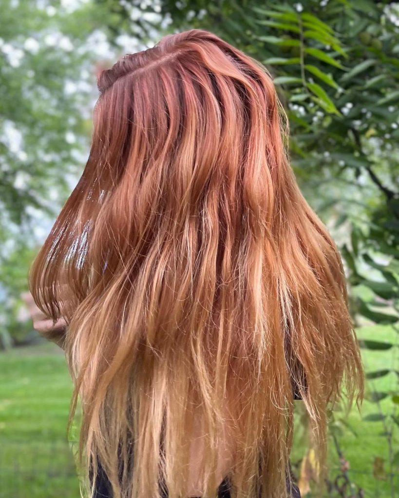 copper blonde balayage with strawberry blonde tones