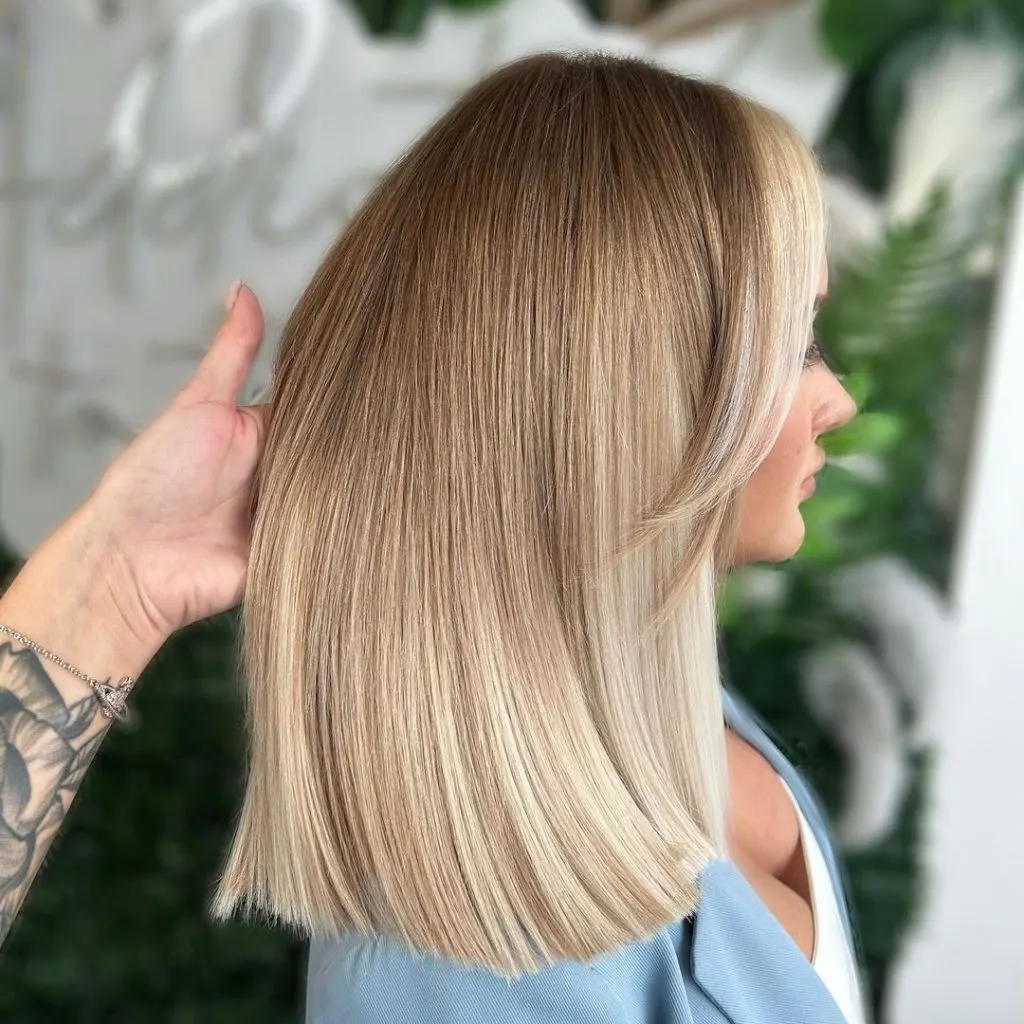 dark blonde hair with bleached tip ends