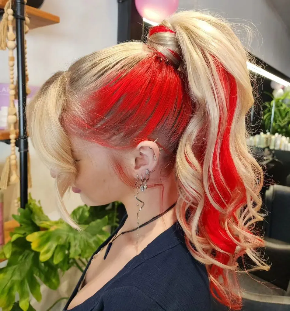 fiery red and blonde ponytail