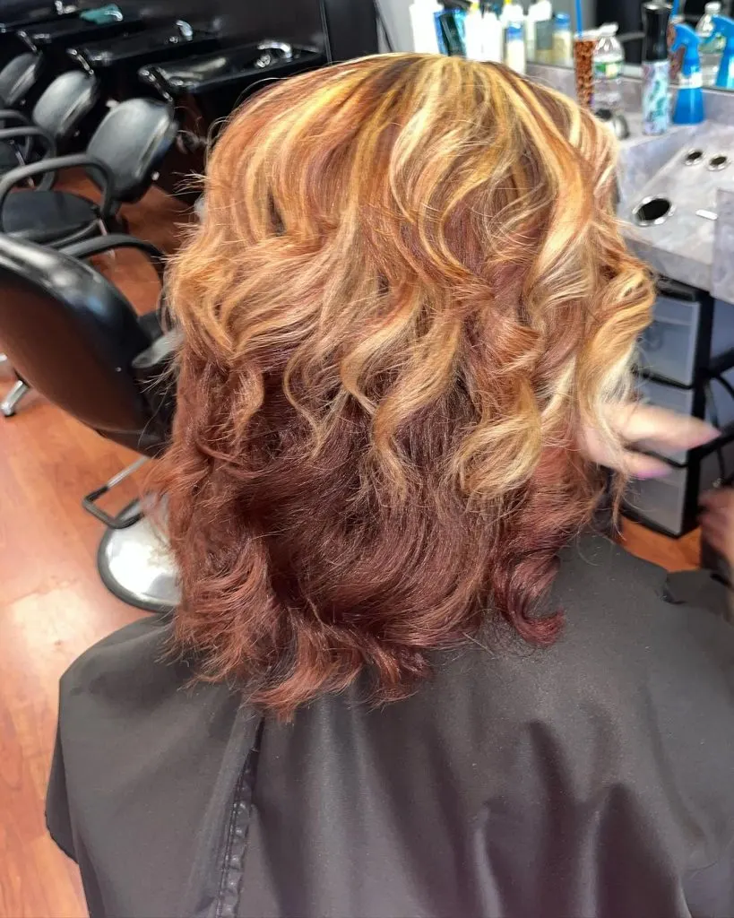 red and blonde layers on curly hair