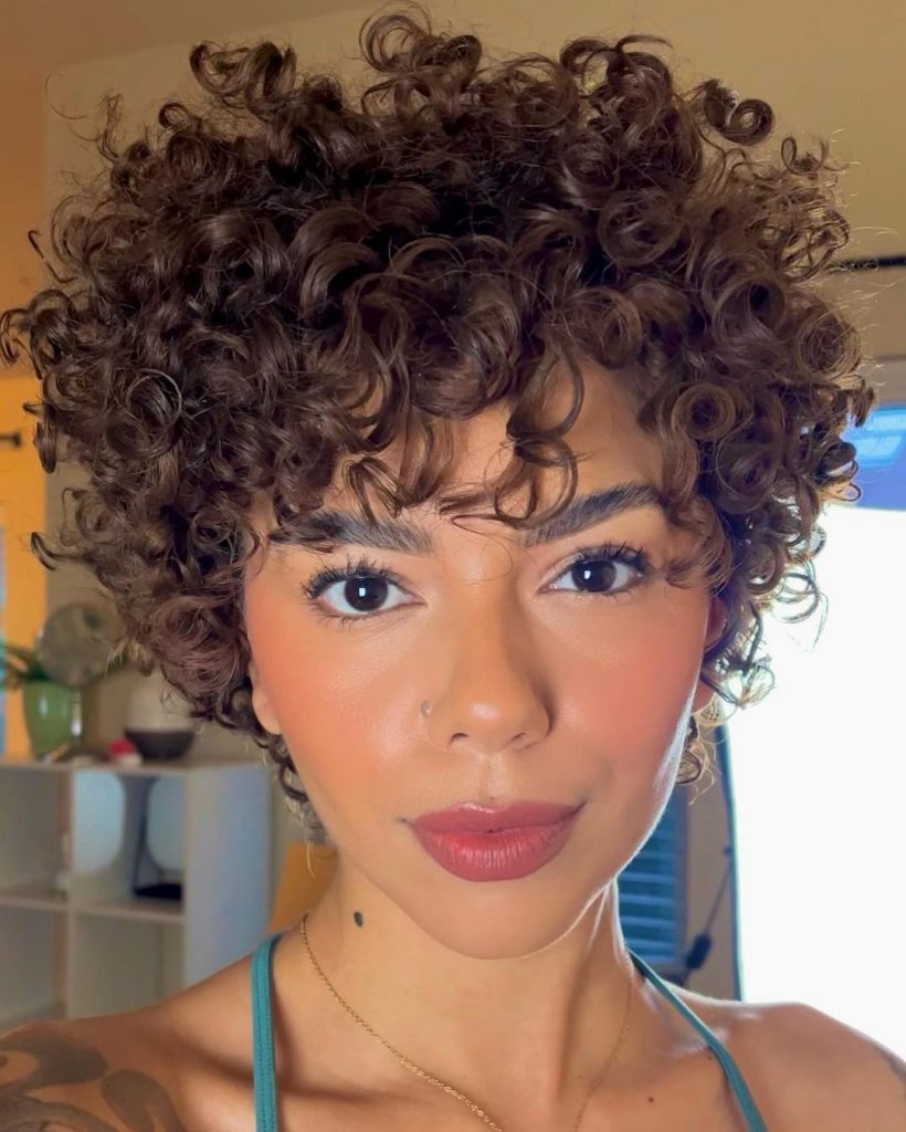 Curly pixie cut with bangs 