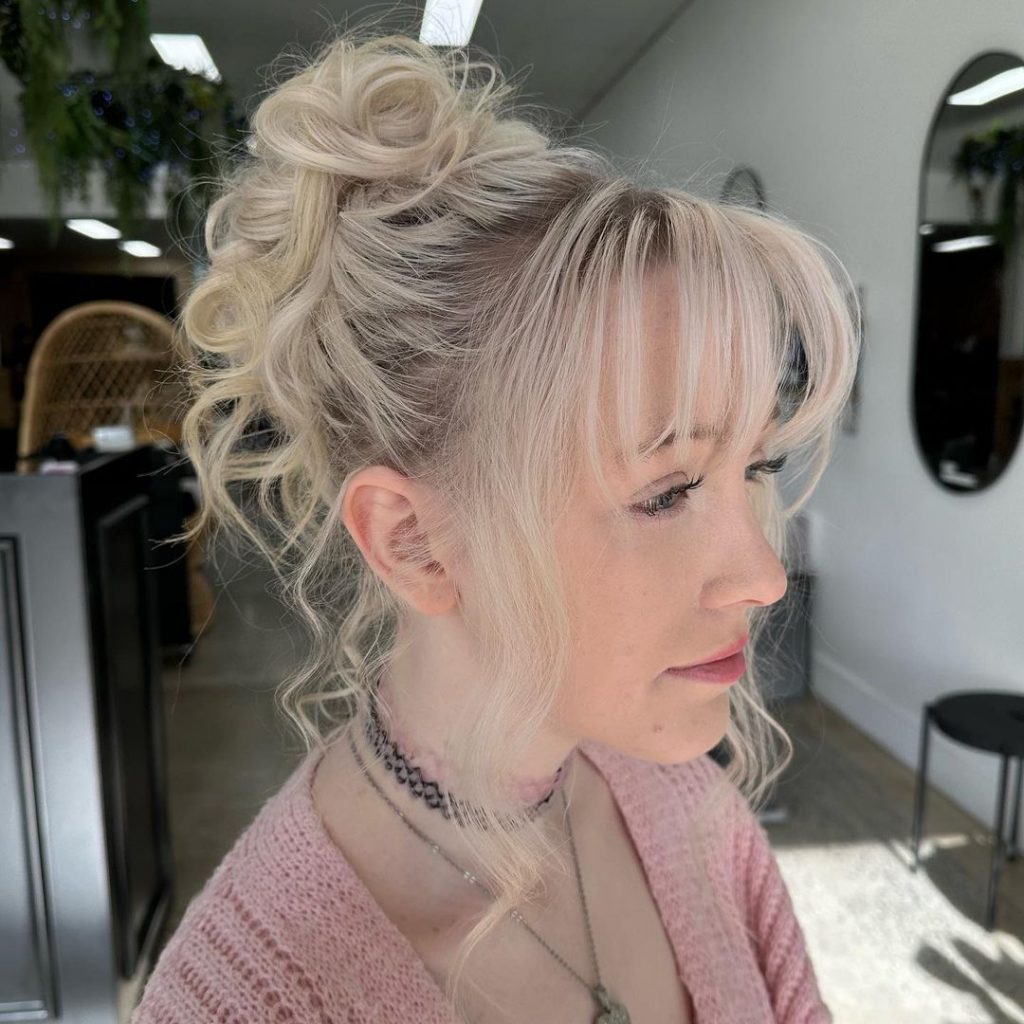 Formal Curled Updo With Wispy Bangs 