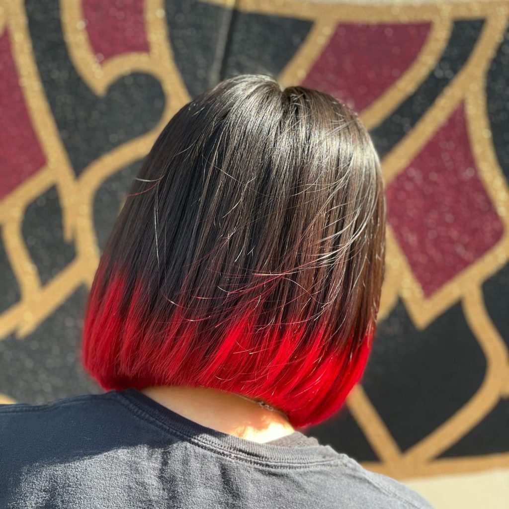 black bob cut with fiery red tips