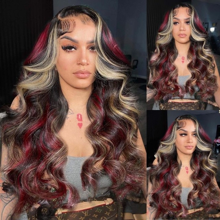 black hair with blonde money piece and red balayage