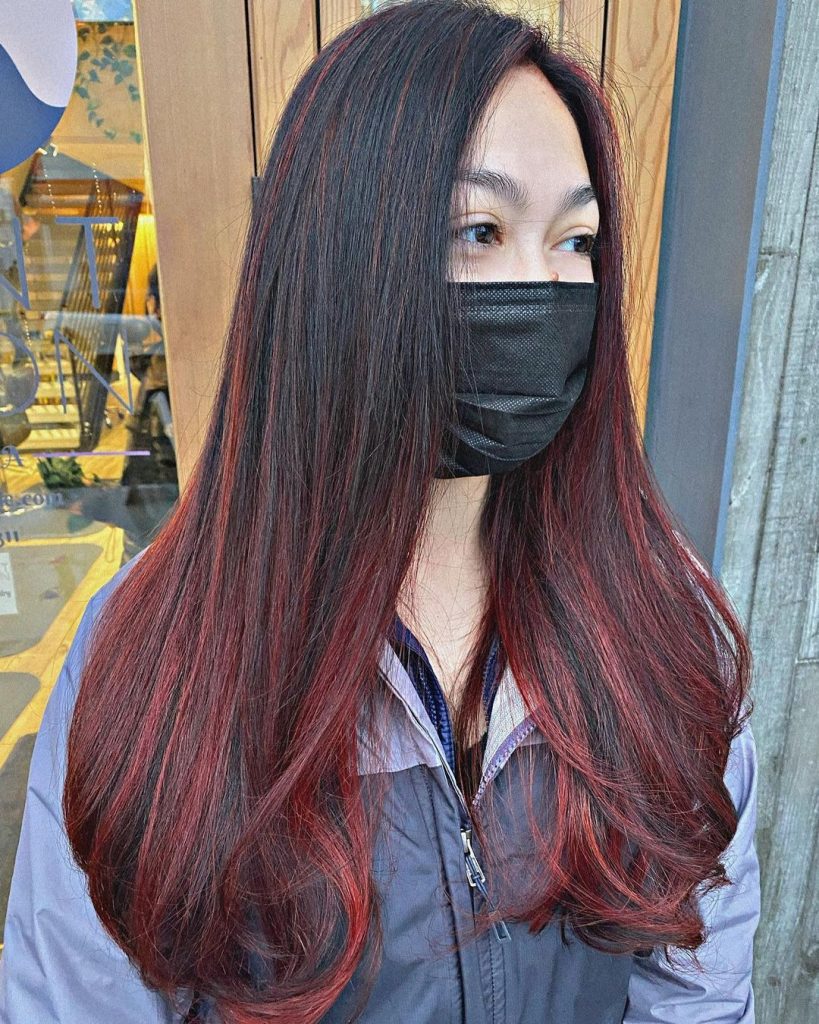 black to subtle red hair