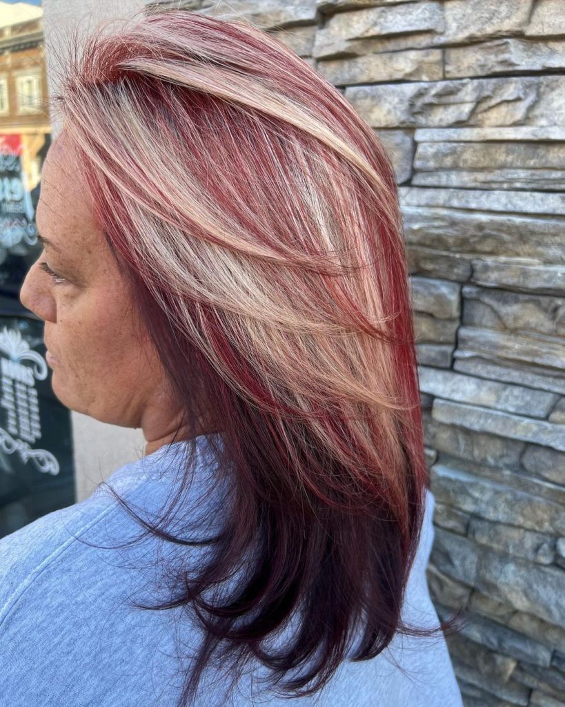 blonde and red highlights on dark hair