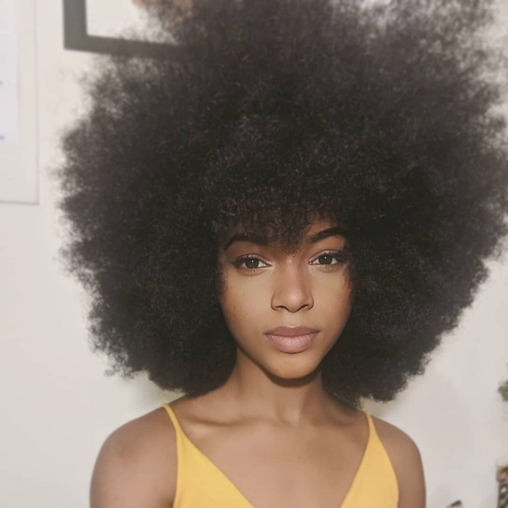 curly afro with bangs 