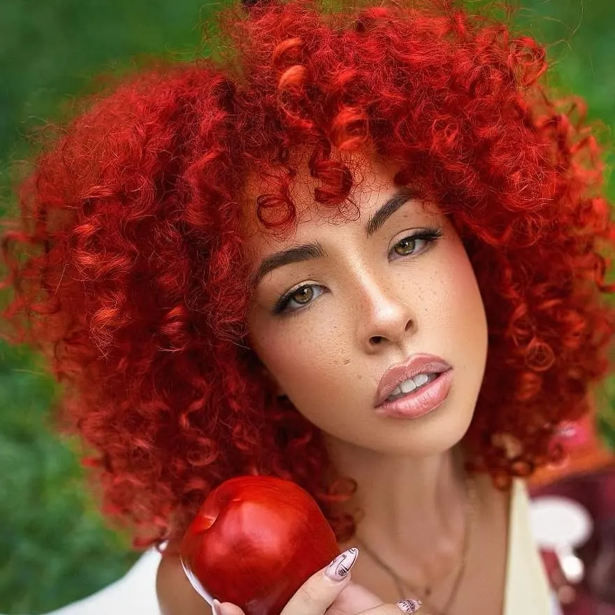 curly red hair with bangs
