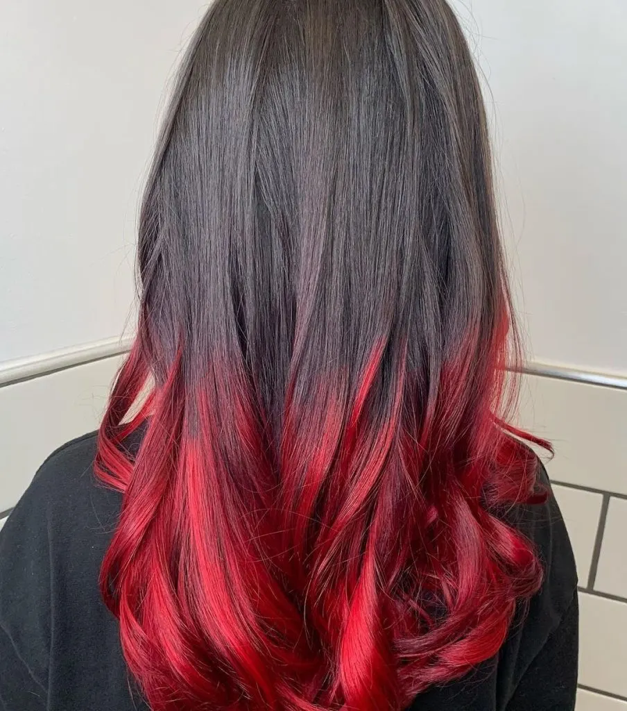 dark hair with bright red tips