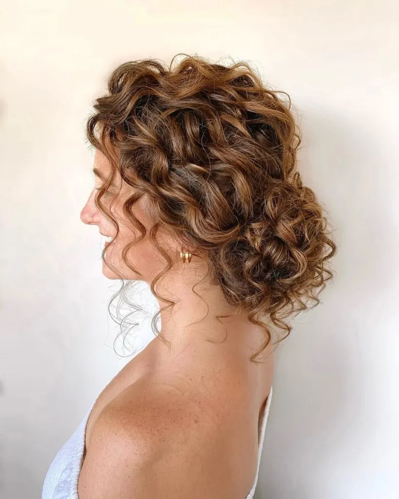 elegant curled updo hairstyle for medium hair