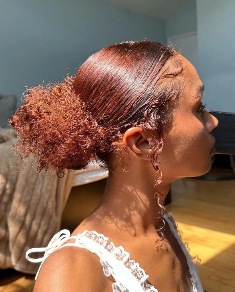 sleek low fluffy bun for 3C hairstyles