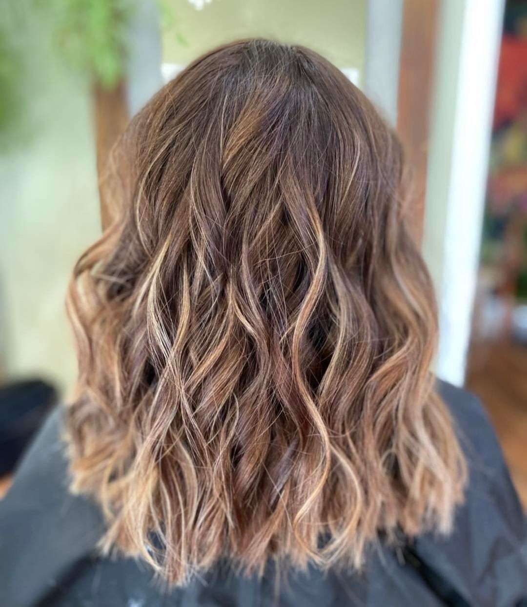 woman with mid-length subtle balayage hairstyle