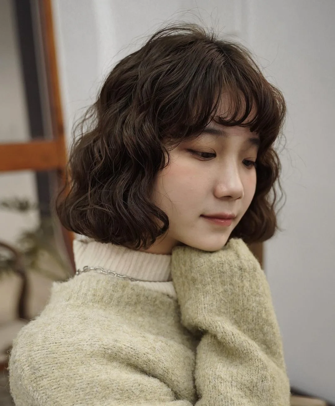 curly lob with bangs