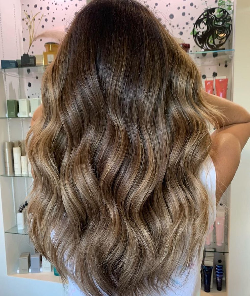 honey brown hair with golden balayage