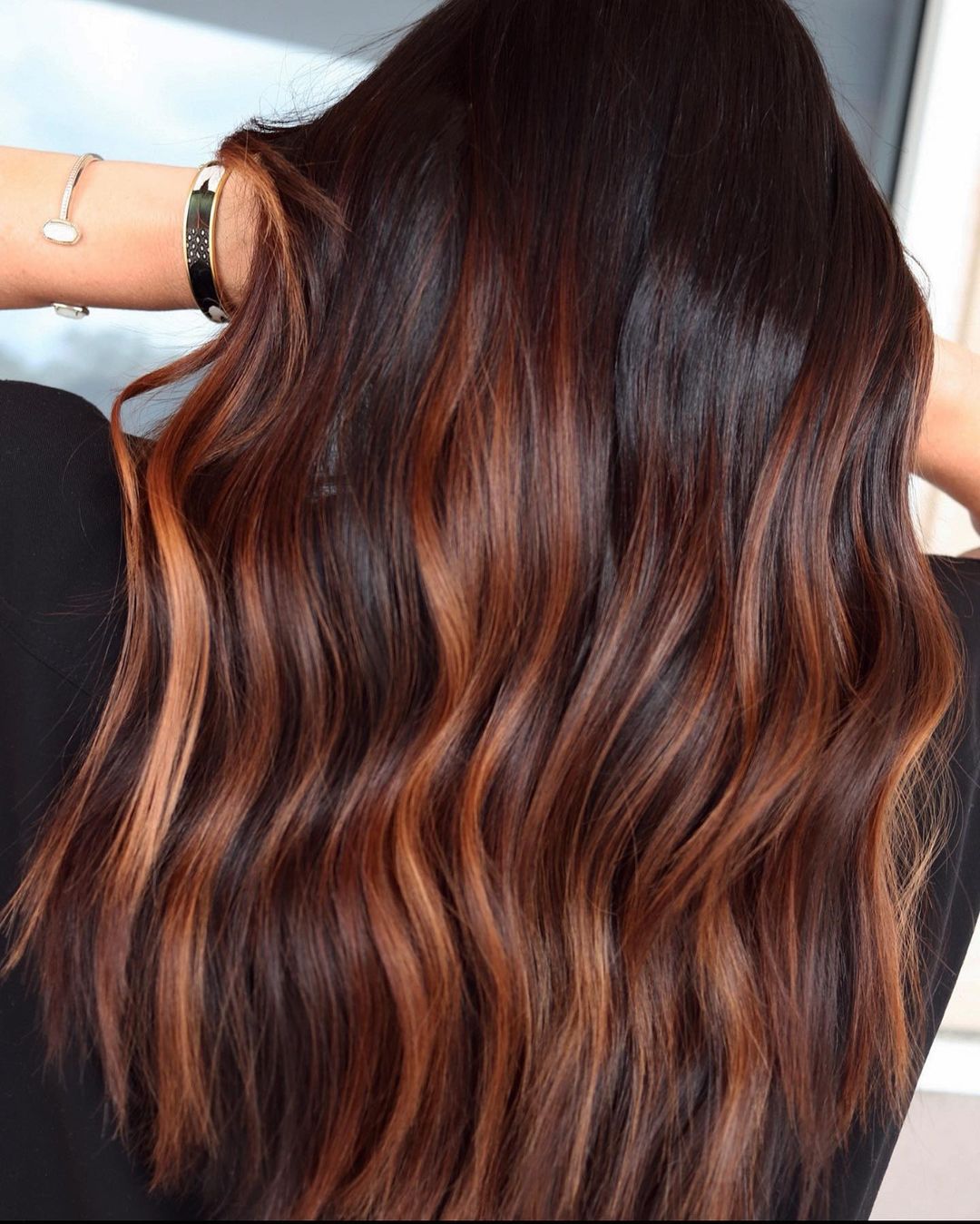brown hair with deep copper streaks