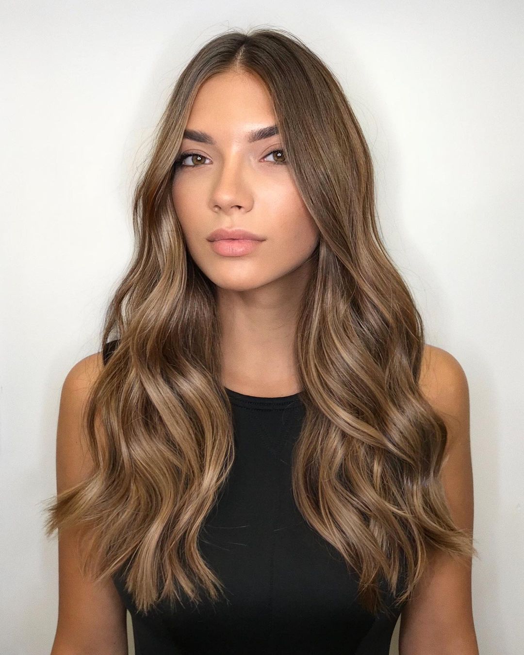 honey brown hair with subtle highlights