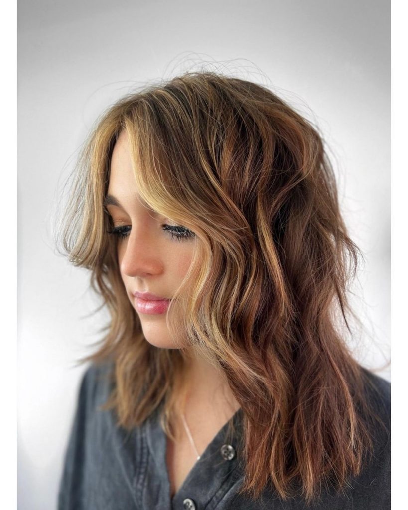 Tousled shag with face framing highlights