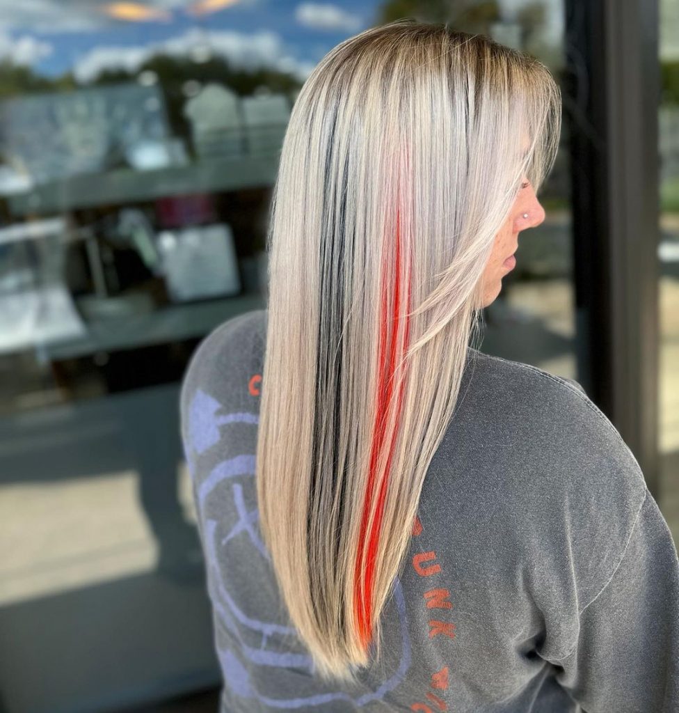 blonde hair with red bright highlights