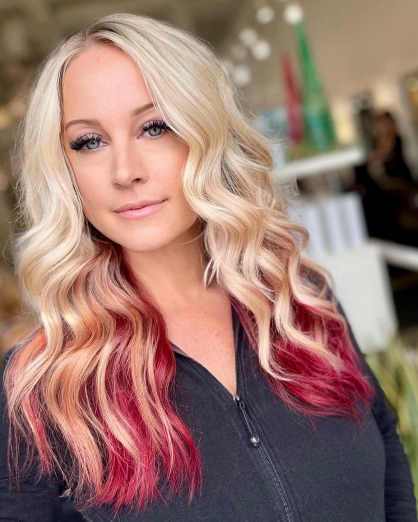 blonde hair with red highlights underneath