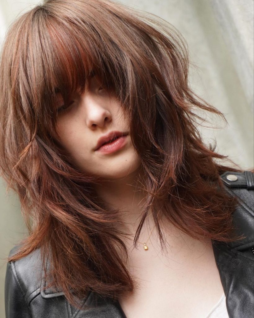 brown hair with red babylights on bangs