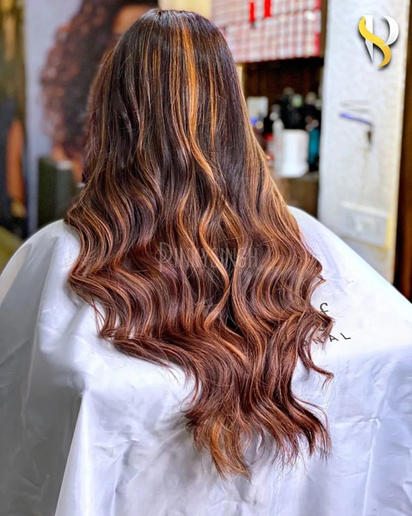 caramel brown hair with red balayage
