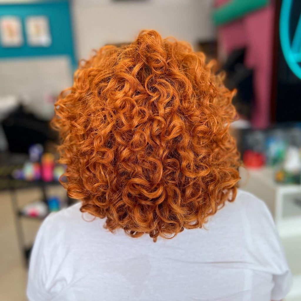 copper pumpkin medium curly hairstyle