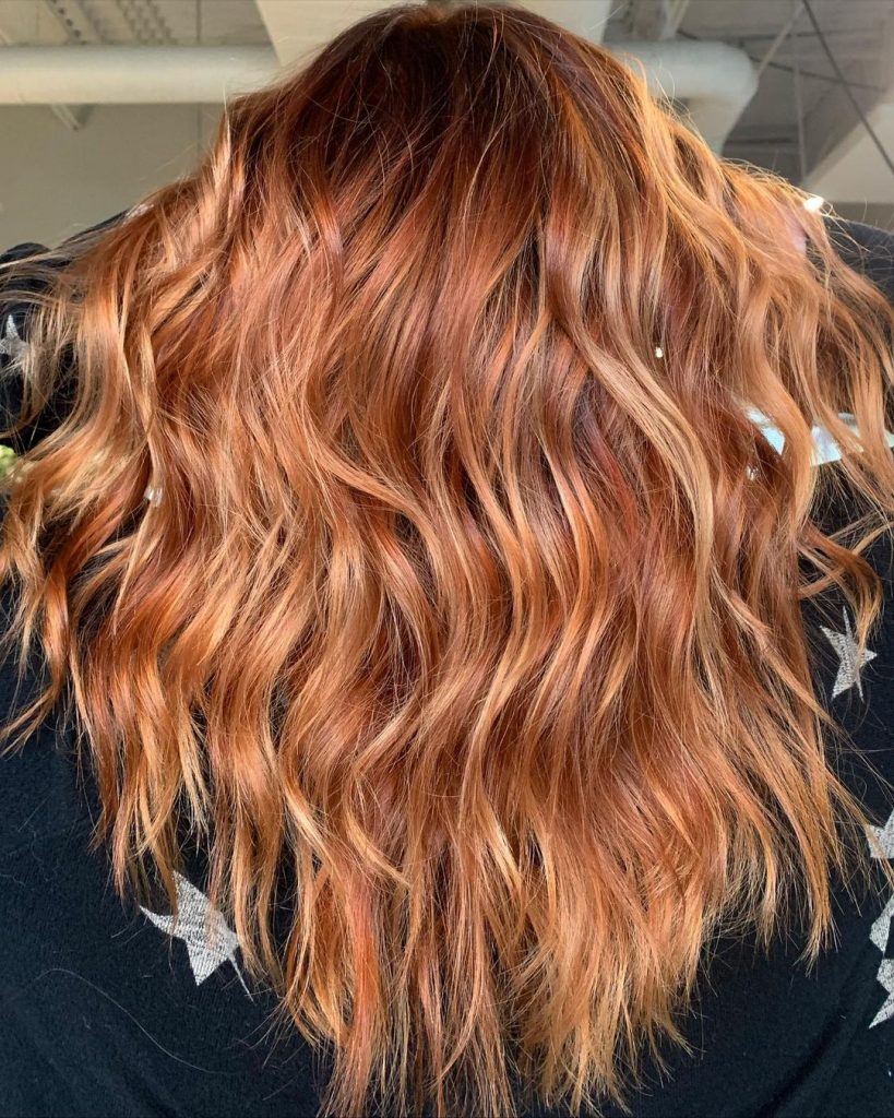 copper red hair with blonde highlights