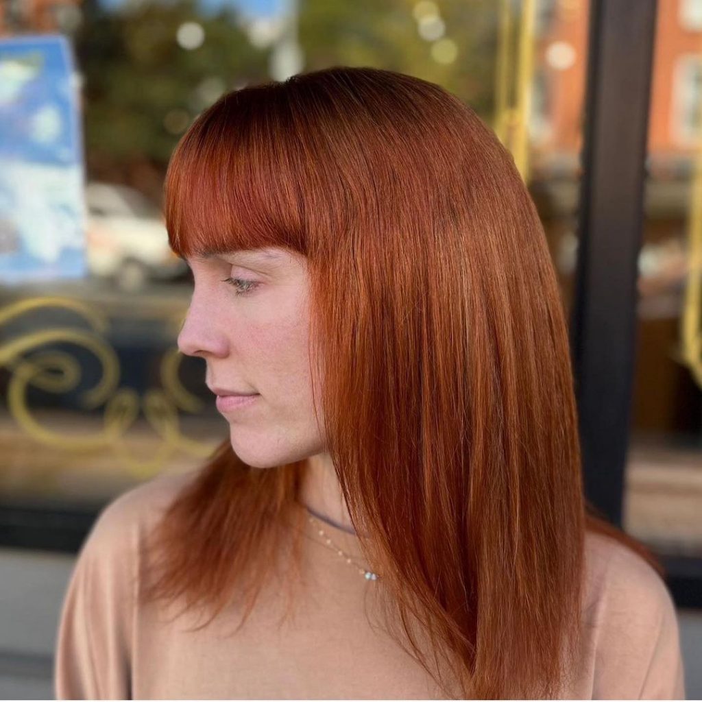 cowboy copper hair with straight bangs