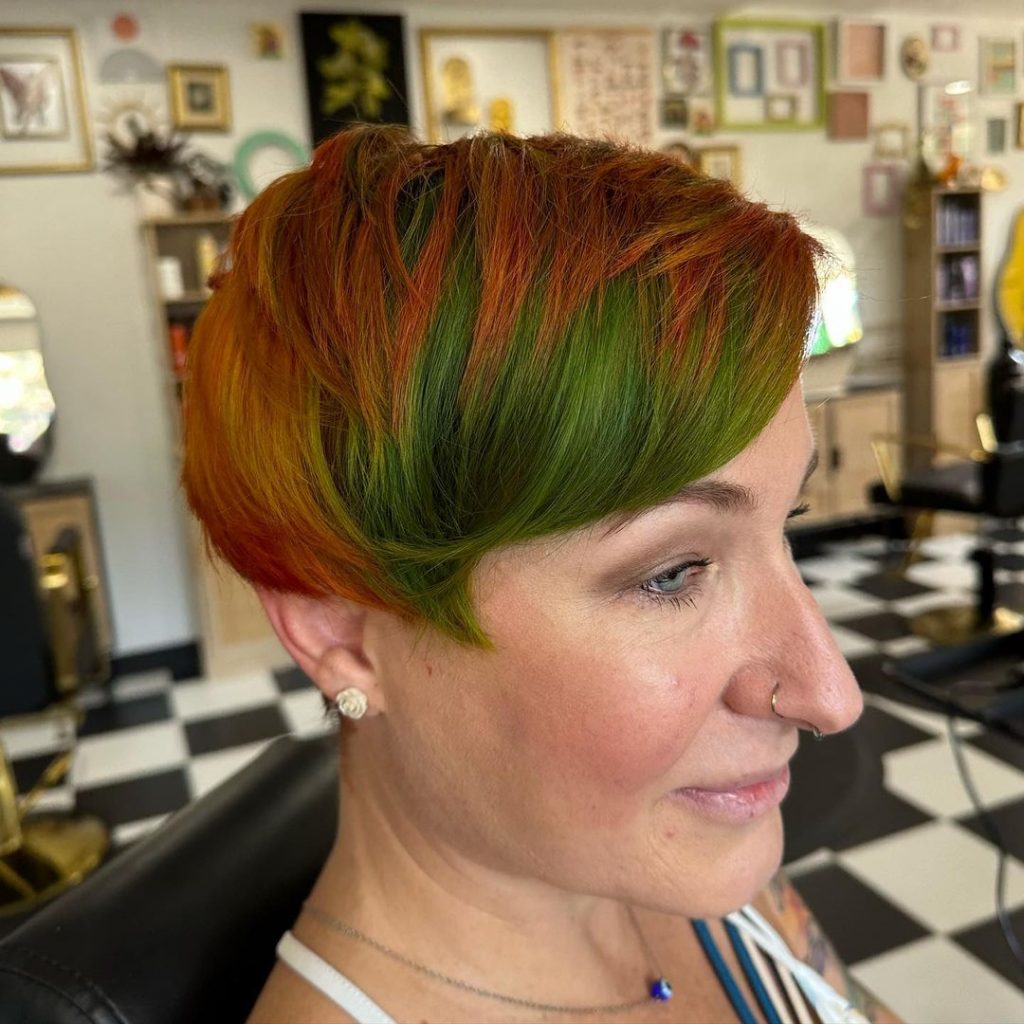 cowboy copper pixie cut with green color blocking