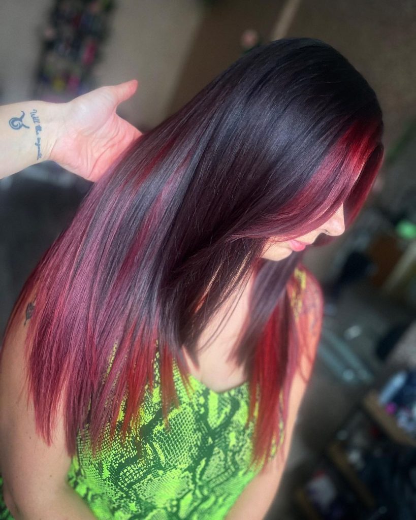 dark brown hair with red ombre and red money piece
