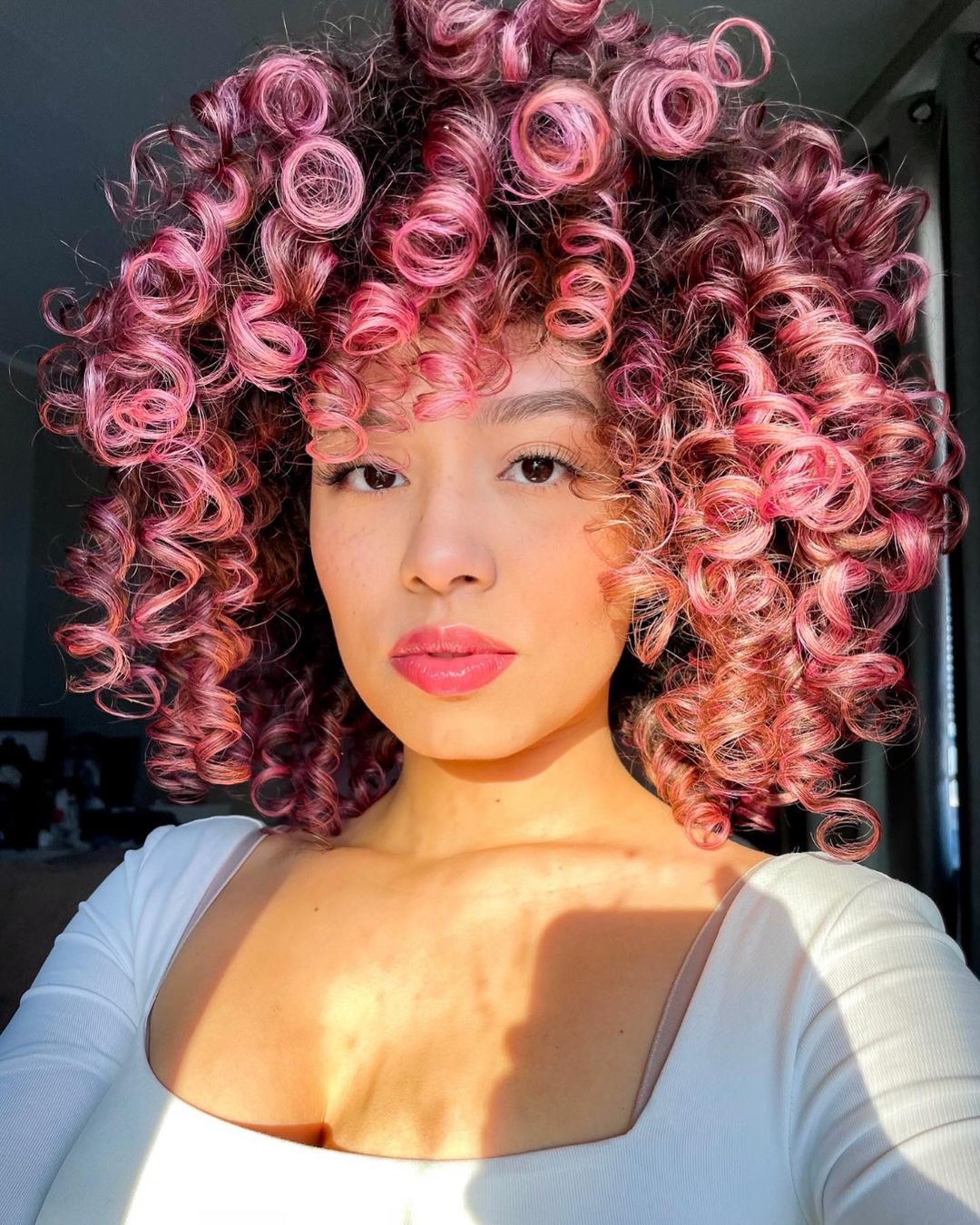 deep pink hair color for curly hair
