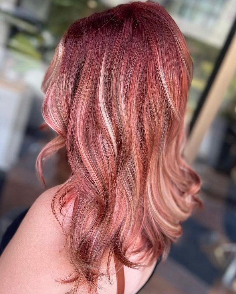 fiery red hair with blonde highlights