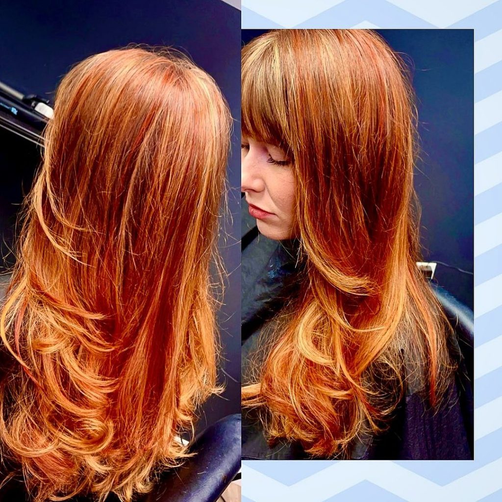 intense ginger hair with subtle blonde highlights