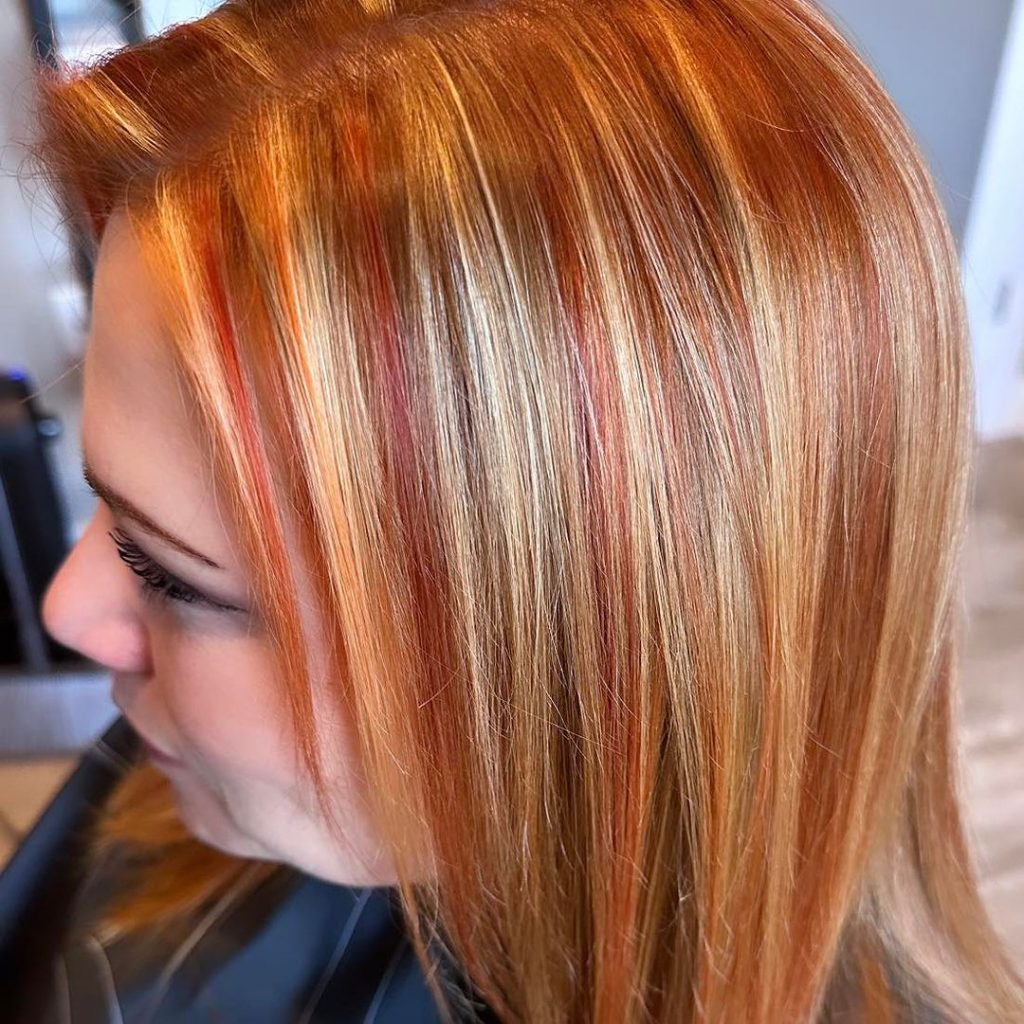 orange red hair with blonde highlights