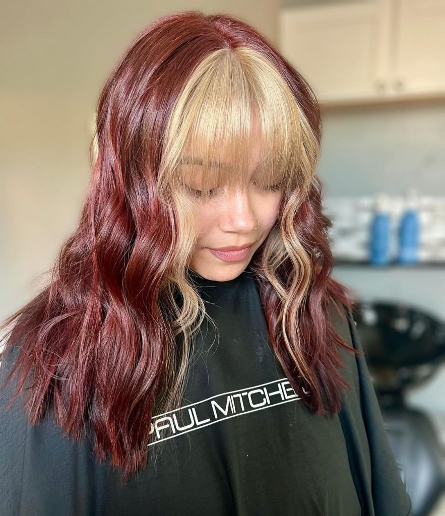 red burgundy hair with blonde bangs