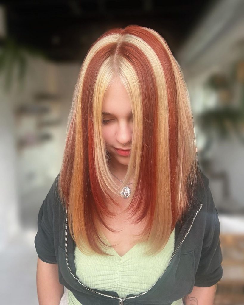 red hair with chunky blonde highlights