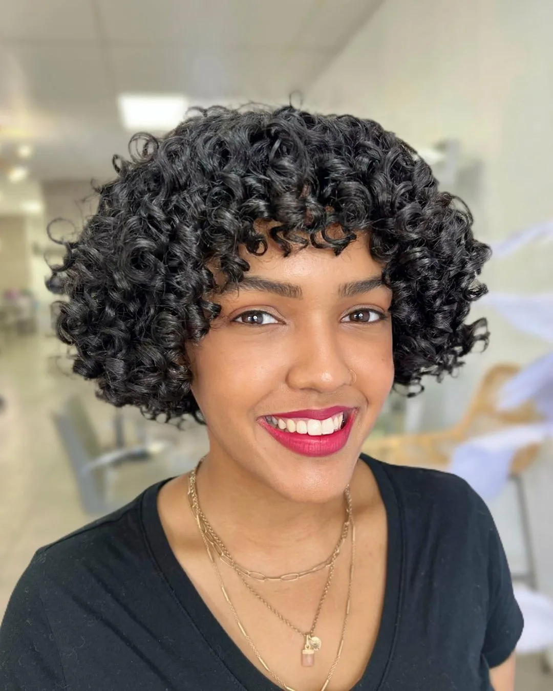 short curly haircut for square faces