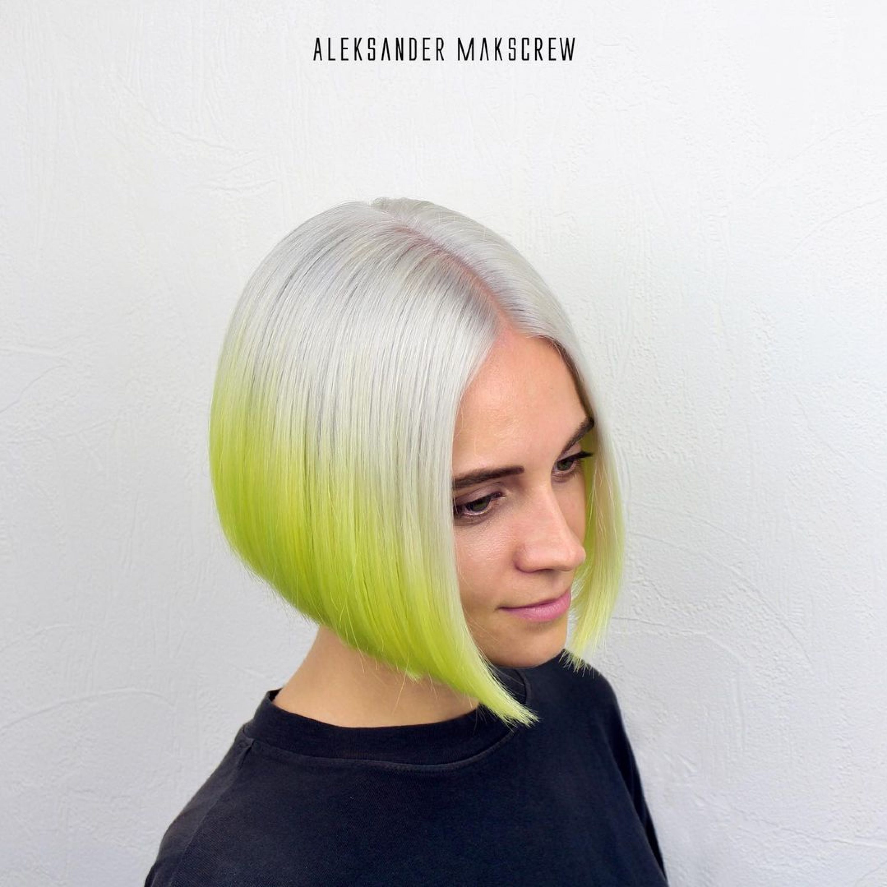 edgy short blonde bob with neon tips