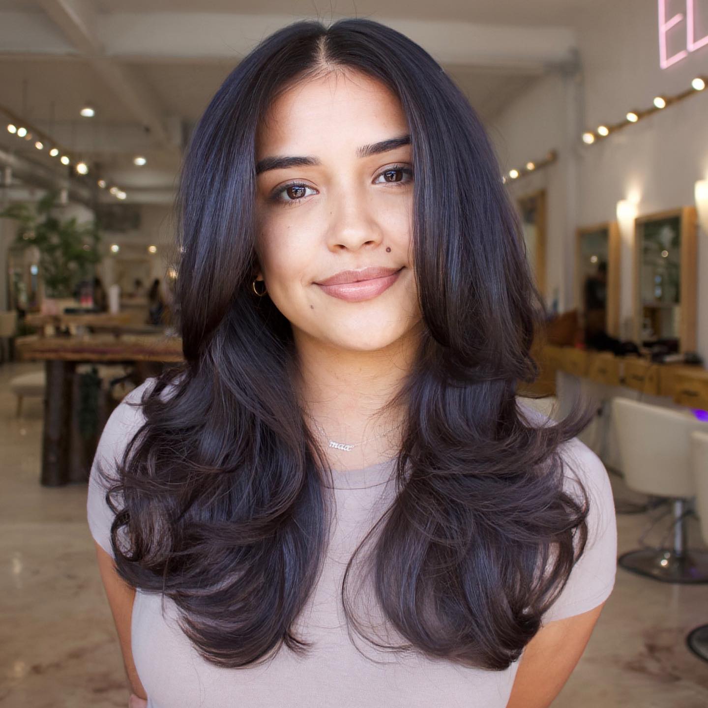 corte de cabelo clássico em forma de borboleta