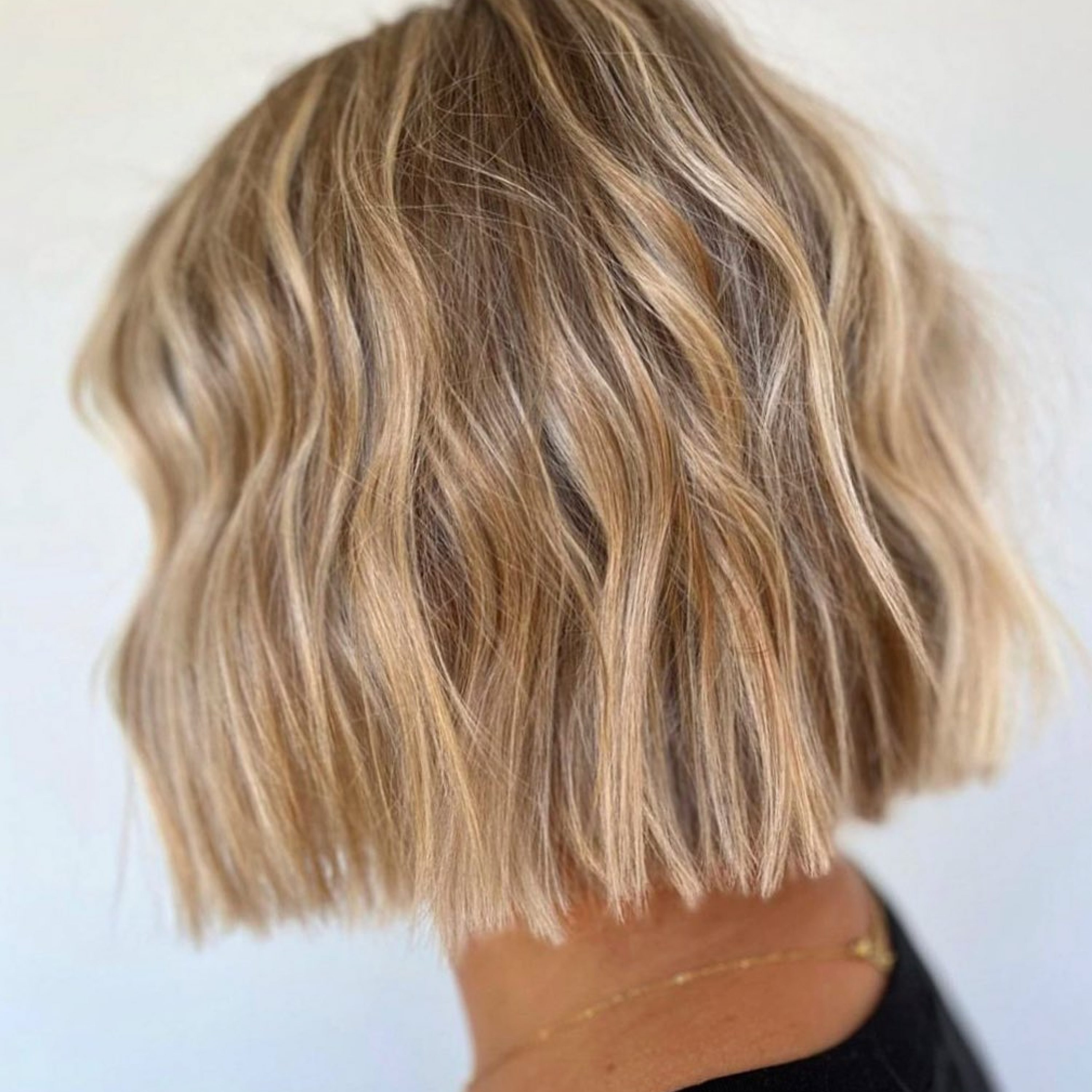 blonde bob haircut with razored ends