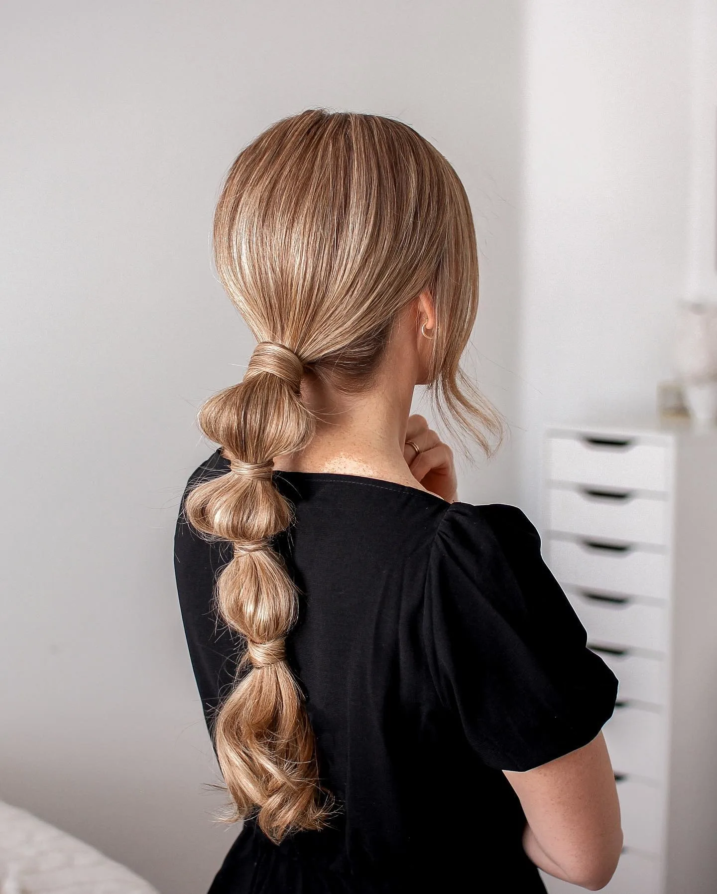 low bubble braid ponytail