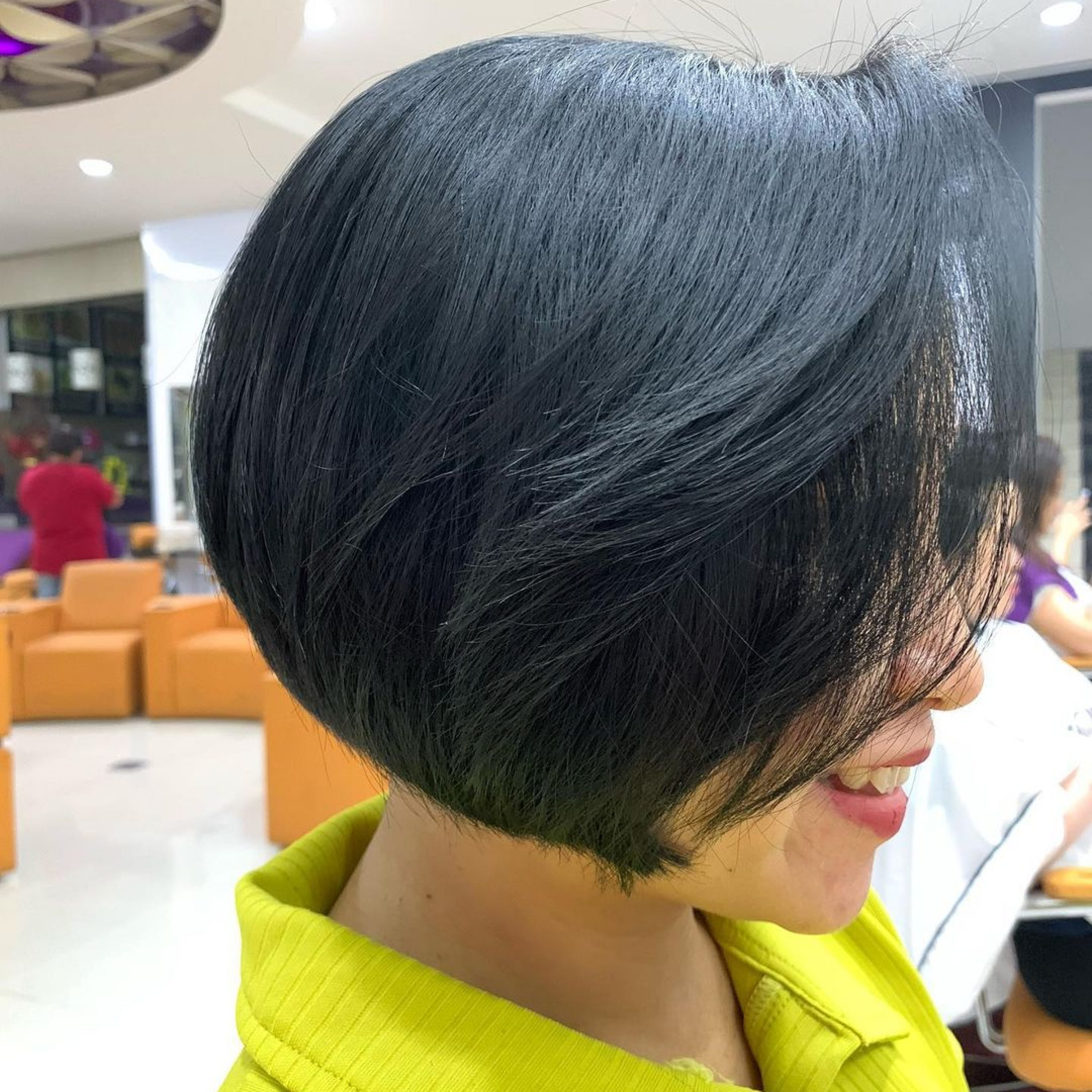 sleek rounded bob with side bangs