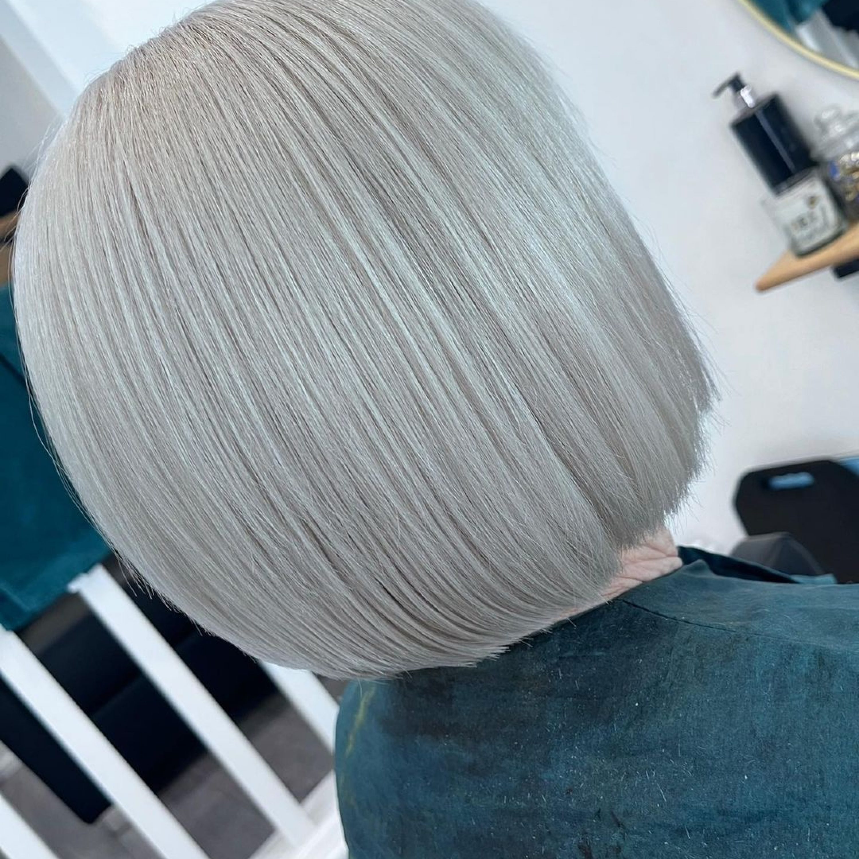 sleek gray blonde bob haircut