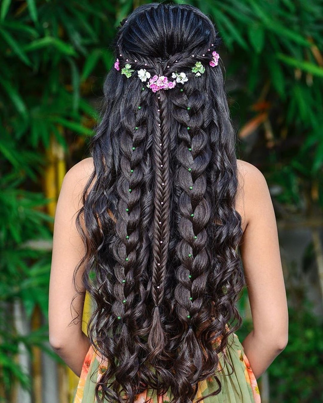 half up half down wedding hairstyle with braids and flowers