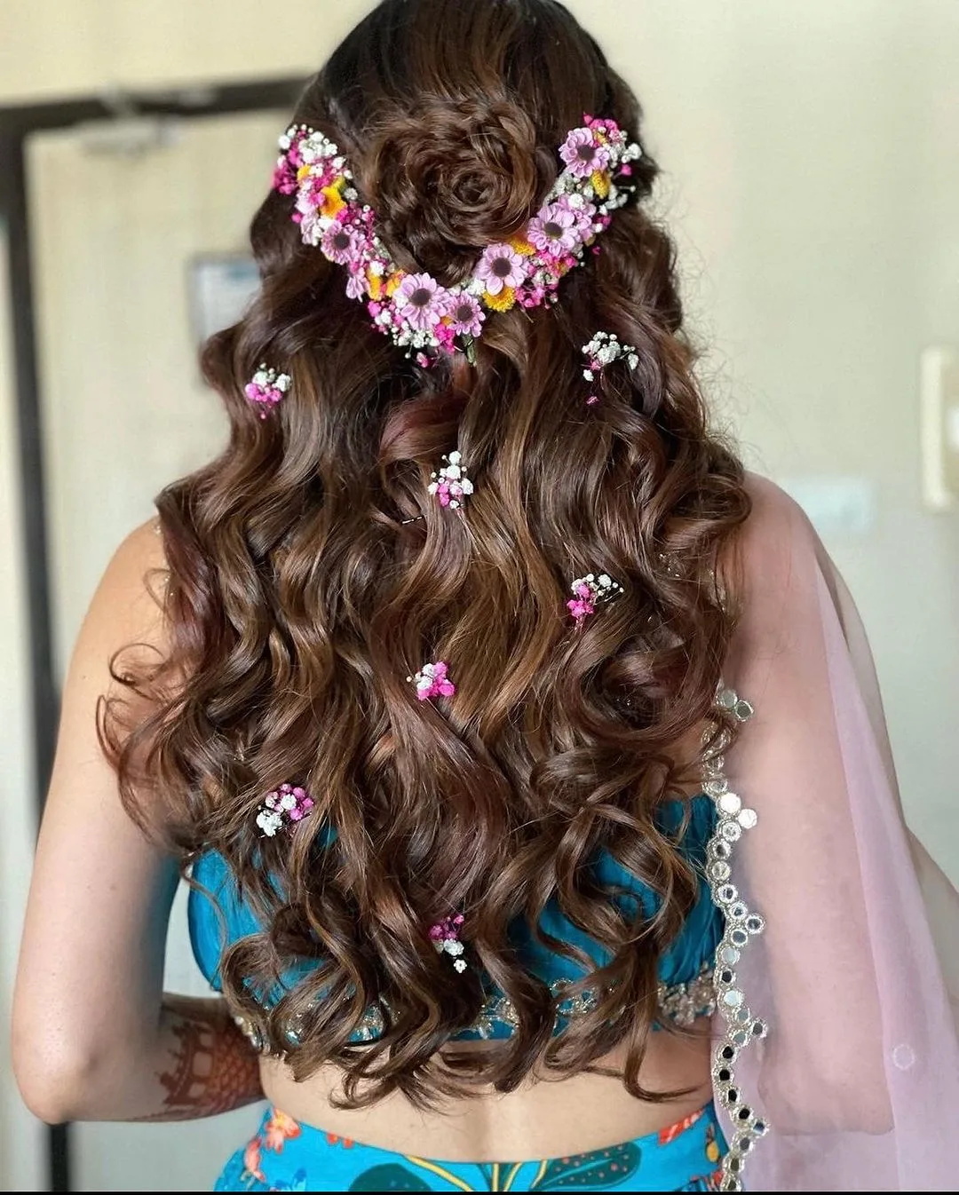 half up half down floral wedding hairstyle